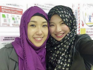 Risa-chan (left), with Arisa-chan after her shahada was taken.